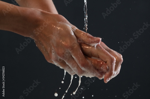 Hand washing with soap under running water from the Covid-19 virus and other viruses.