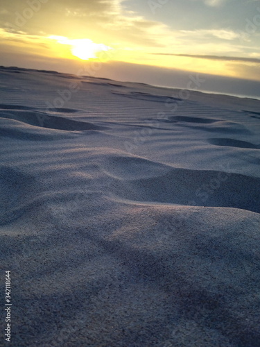 Poland Baltic Sea. View of the sandy Baltic beach. An empty beach Sunset.