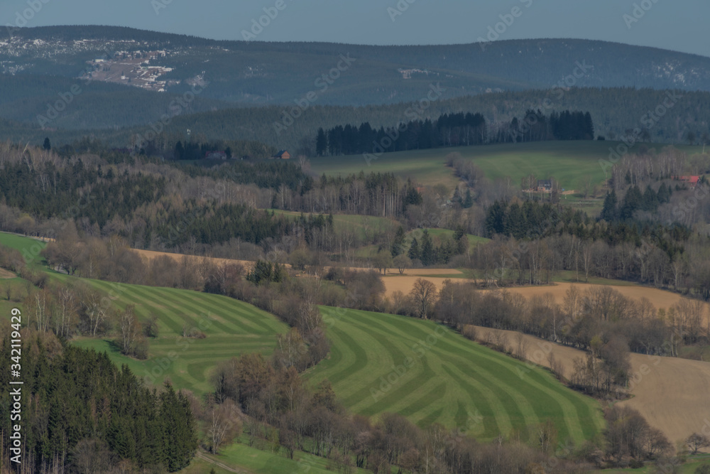 Meadows near Krkonose mountains in spring nice day
