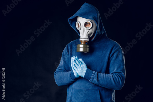 Portrait of a man in a gas mask.  Panic during quarantine. Coronavirus pandemia concept