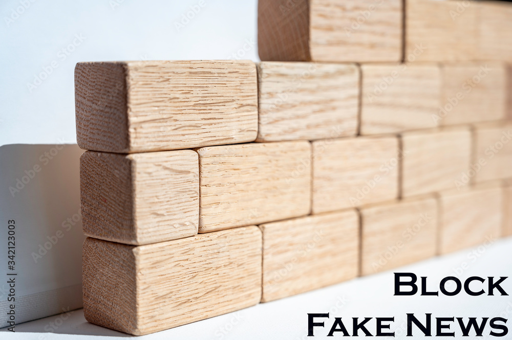 Wooden building blocks forming a wall as a concept to Wooden building blocks forming a wall as a concept to