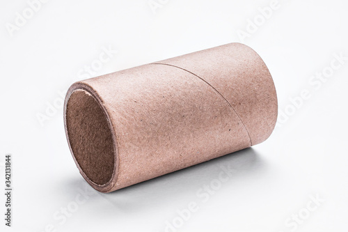 Thick cardboard cylindrical tube on a white background with clipping path