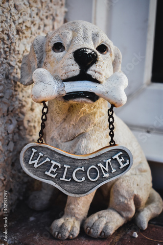 Sad welcome dog with no one to welcome
