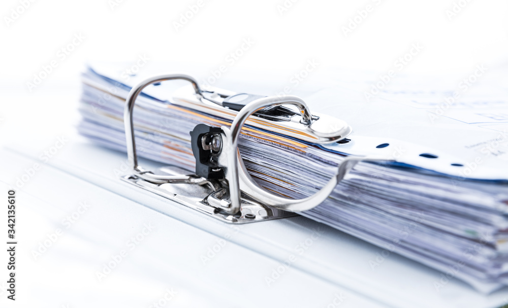 Detail of open folder filled with documents Detail of open folder filled with documents