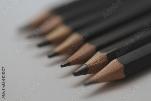 Abstract background of pens with extremely flat dof. Selective focus limited to front pin.