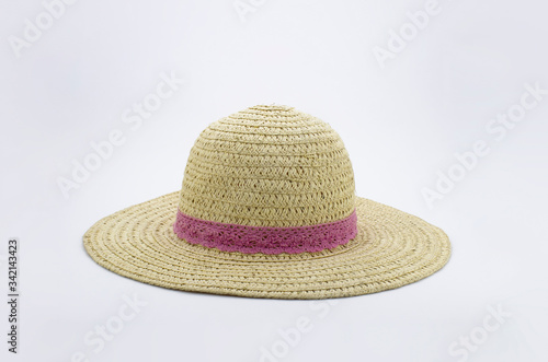 Womens summer yellow straw hat with the ribbon, isolated on white background.