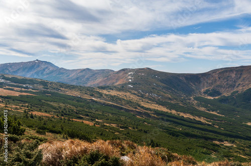 Large mountain range. Great mountain plain. Mountain range in the daylight.