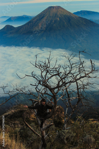 very beautiful sunrise on the summit of sumbin mountain wonosobo central java indonesia.
this photo was taken at around 6.30am on July 21, 2018 photo