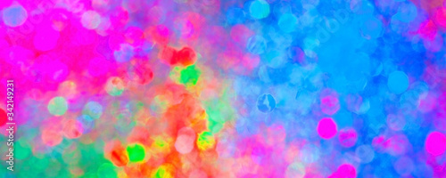 abstract colorful lights for celebration textured glass, blurred