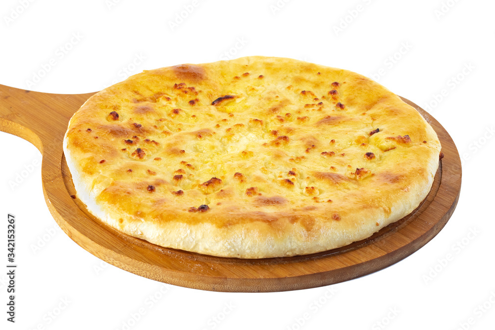 Georgian traditional food khachapuri on a wooden dish on white background Georgian traditional food khachapuri on a wooden dish on white background