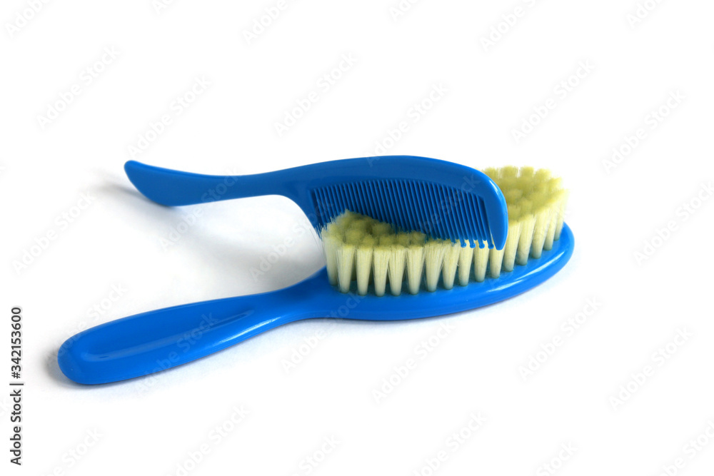 blue baby combs close-up on a white background blue baby combs close-up on a white background