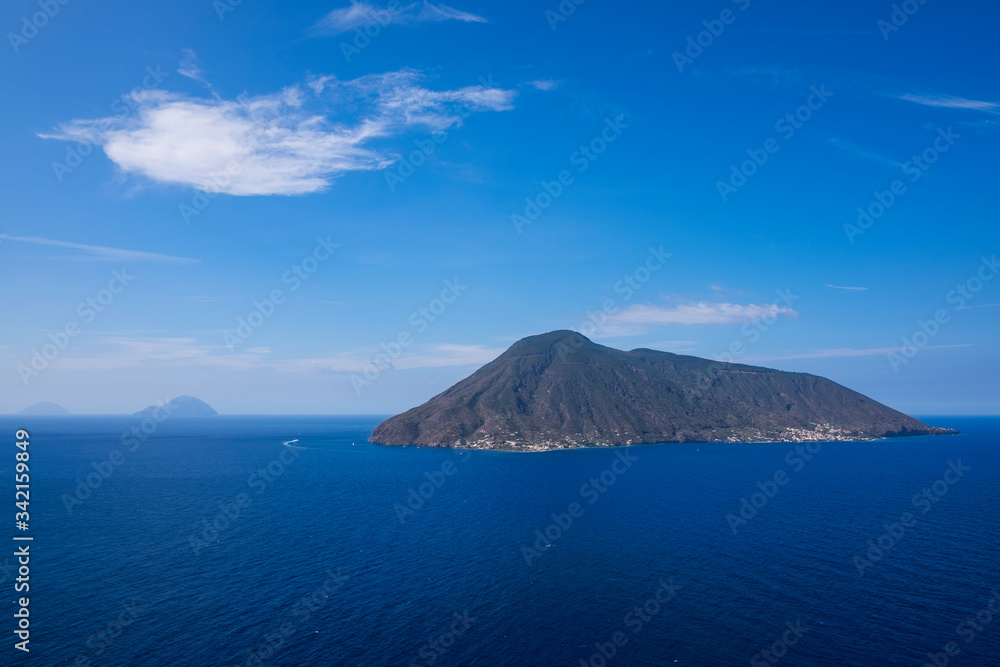 Volcano islands Salina, Alicudi, Filicudi during blue sky day, Sicily Italy.