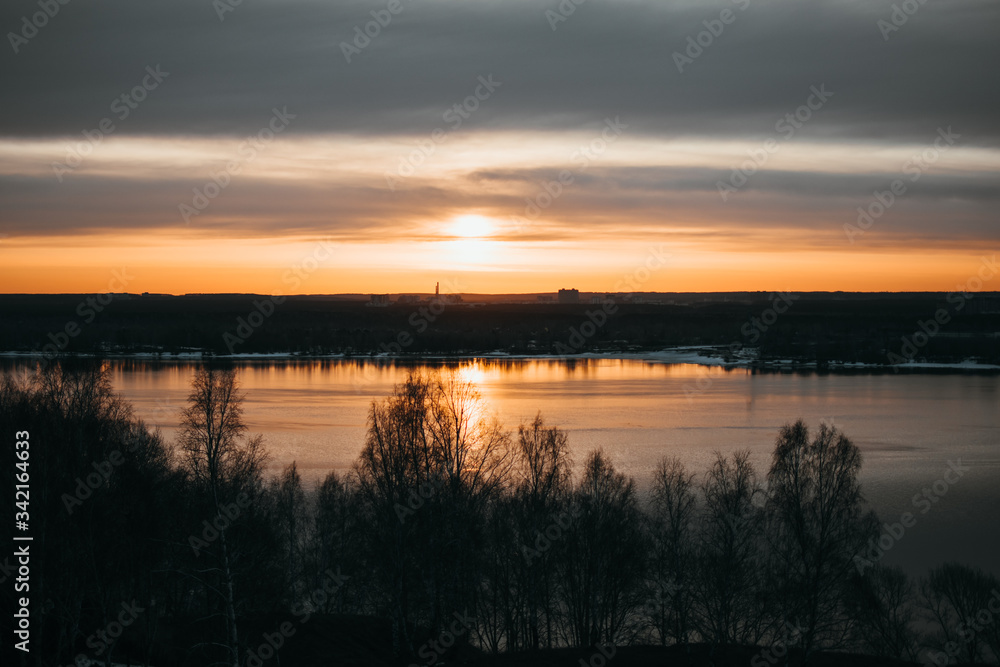 View of the sunrise and the river from a high-rise building.