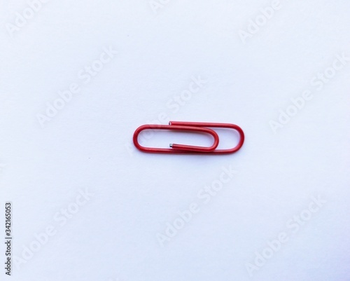 paper clips on a red background