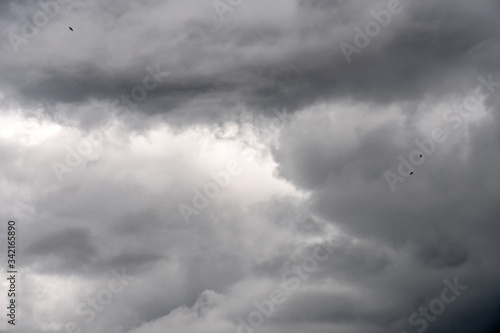 Dark storm sky with light part, overcast sky