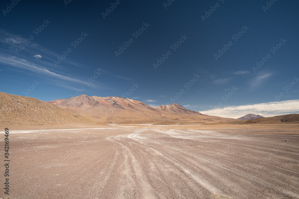 High Andean altiplano desert in Bolivia with jeep tracks on Ruta de Las Lagunas