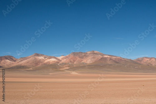 Panorama of Andean mountain ridge and desert in Bolivia on Ruta de Las Lagunas