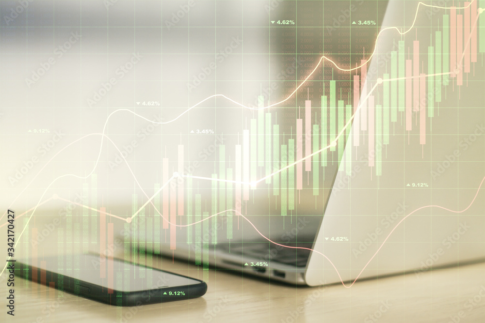 Abstract creative financial graph on modern laptop background, financial and trading concept. Multiexposure Abstract creative financial graph on modern laptop background, financial and trading concept. Multiexposure