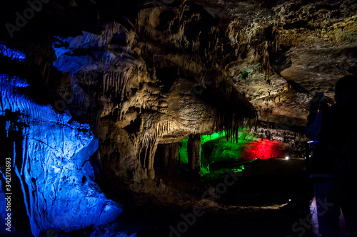cave with rock growths with illumination