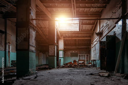 Old broken empty abandoned industrial building interior