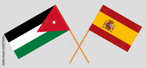 Crossed flags of Jordan and Spain photo
