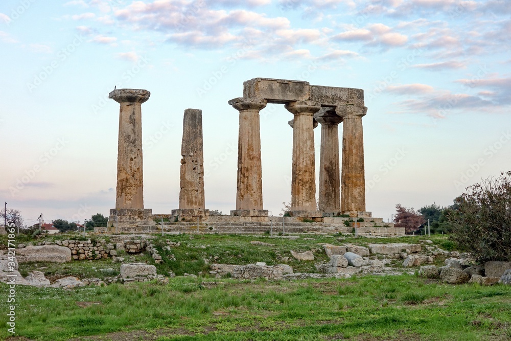 Temple of Apollo in Archaological Site Of Corinth And after sunset in Greece