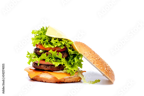 Cheeseburger or hamberger on a white background. Fast food photo