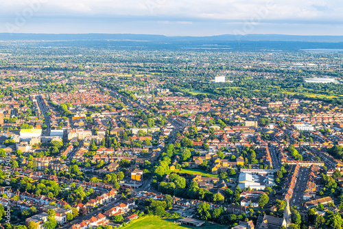 Photography Aerial high angle above view from airplane over city suburbs of London in United