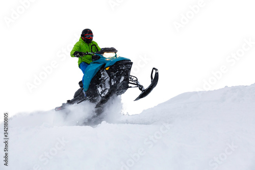 Cuadro en lienzo Adventurous Man Riding a Snowmobile in white snow