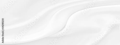 White gray satin texture that is white silver fabric silk panorama background with beautiful soft blur pattern natural.