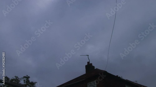 Passenger jet flying low over Manchester airport photo