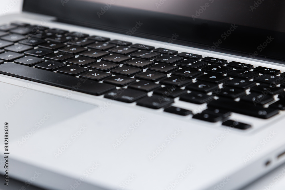 Computer keyboard in shades of black with white background. Computer keyboard in shades of black with white background.