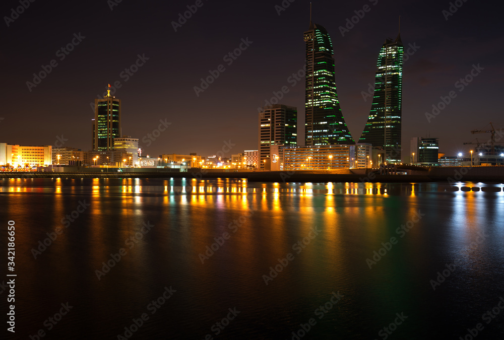 Fototapeta premium Bahrain Skyline at night, a view from Bahrain bay