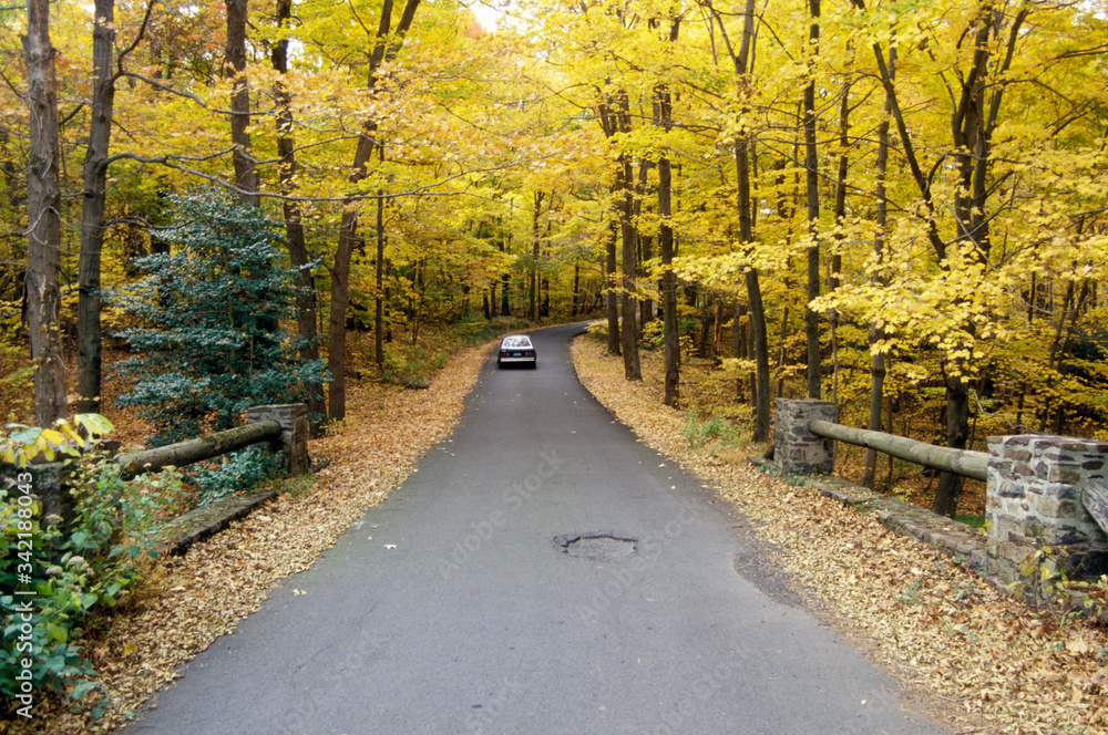 A car traveling on scenic Route 29 in New Jersey A car traveling on scenic Route 29 in New Jersey