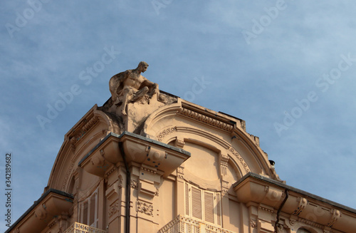 decorative statue on the roof of a prestigious building