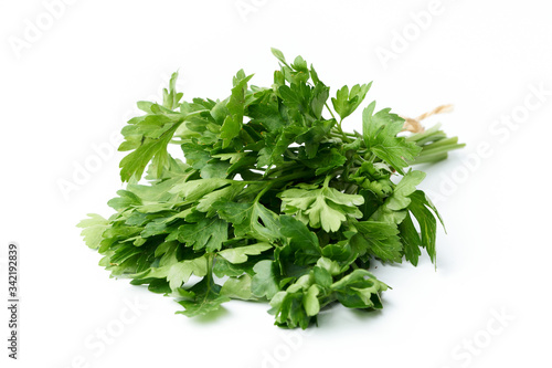 Bunch of fresh parsley isolated on a white background