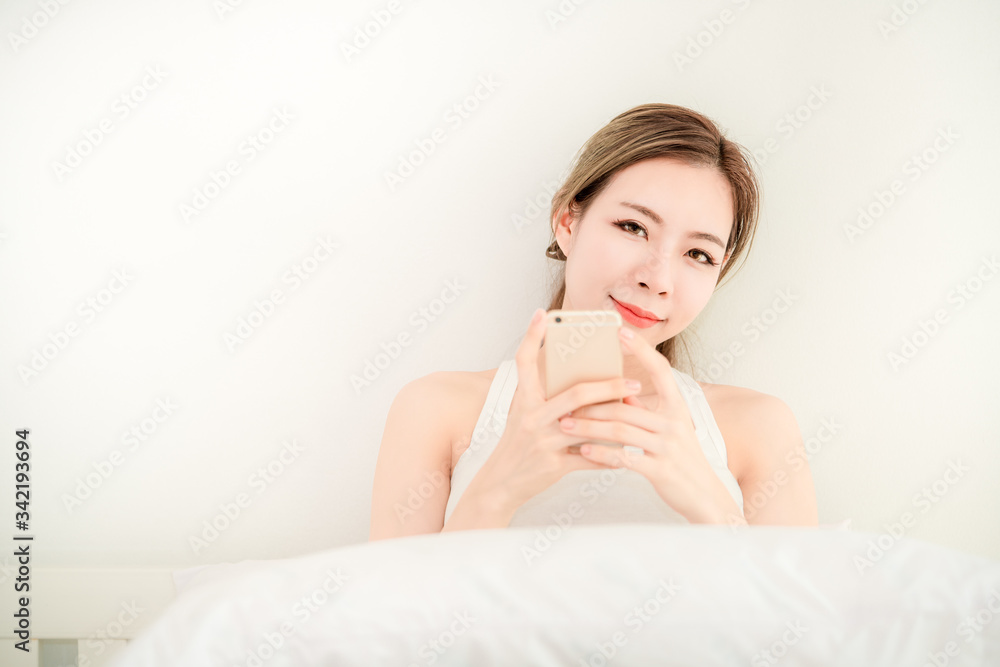 Young beautiful asian girl and mobile smart phone with copy space using as background business technology, shopping online concept. Young beautiful asian girl and mobile smart phone with copy space using as background business technology, shopping online concept.