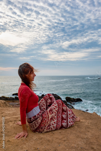 Woman relaxing by the beach in Peru (ID: 342199258)