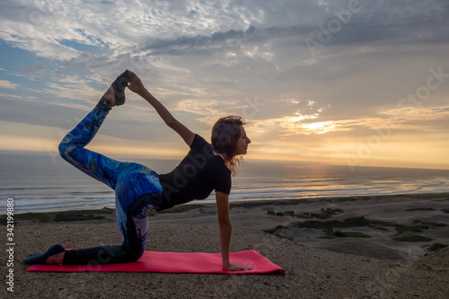 Woman doing Yoga -  Sunset in Peru (ID: 342199880)