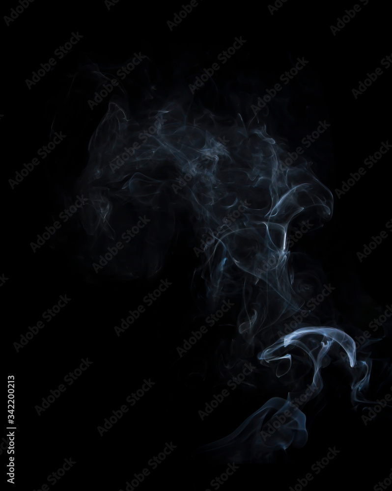Obraz premium movement of smoke on black background, smoke background, abstract smoke on black background