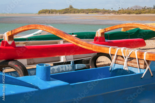 colorful canoes on the beach