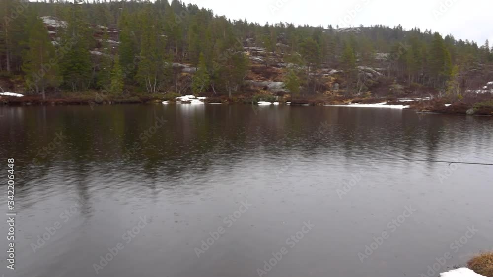 Person fishing alone in the wilderness Person fishing alone in the wilderness
