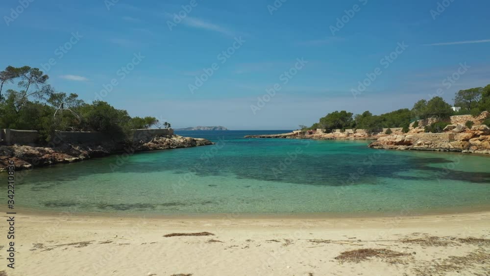 Aerial video with drone of a Cala Gració beach, on the island of Ibiza. Completely empty for COVID-19. Aerial video with drone of a Cala Gració beach, on the island of Ibiza. Completely empty for COVID-19.