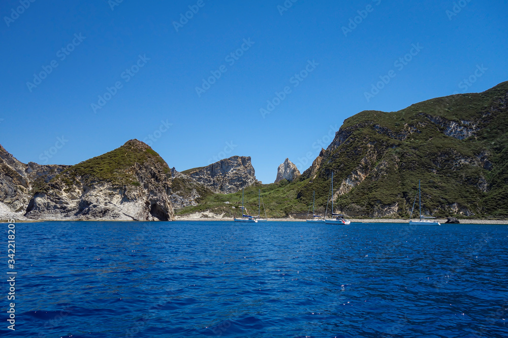 View of a rocky beach along  the seacoast  in Ponza island (Latina, Italy).