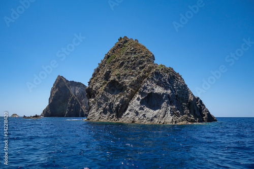 View of a big cliff along the seacoast in Ponza island (Latina, Italy).