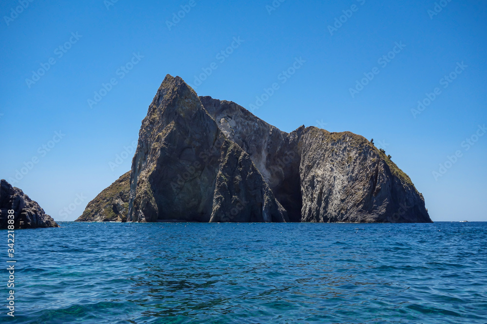 View of a big cliff along the seacoast in Ponza island (Latina, Italy).