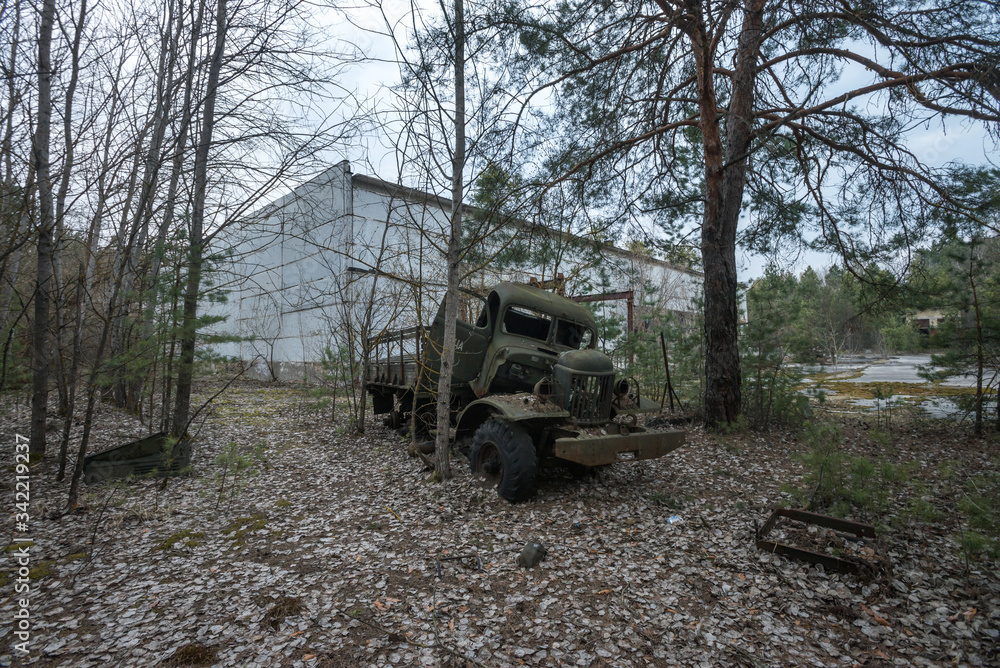 Abandoned truck near ghost town Pripyat in Chernobyl zone
