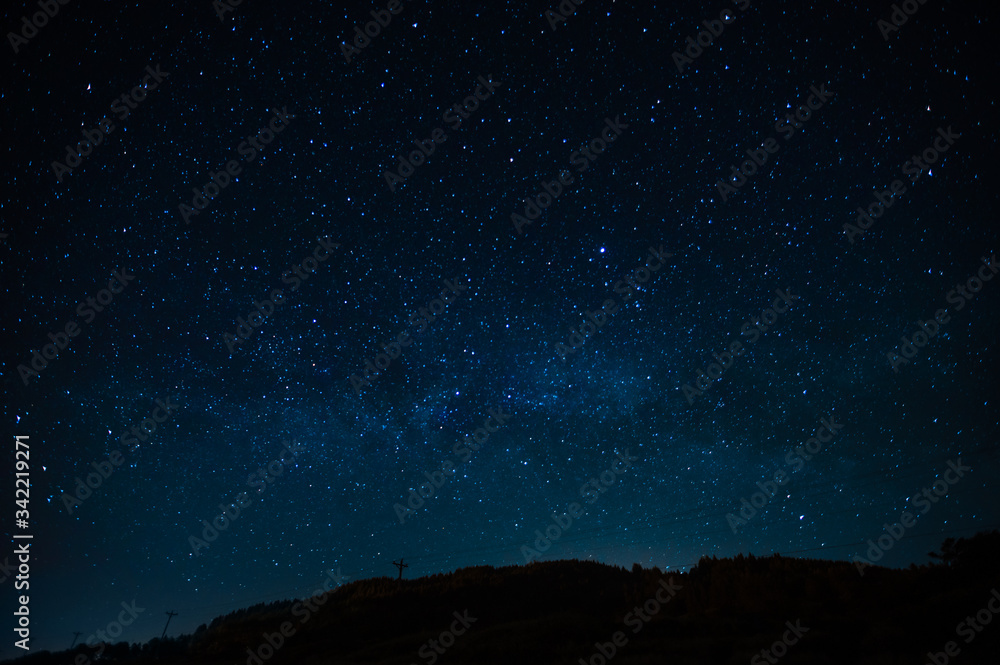 Night landscape with starry sky. Astrology, space