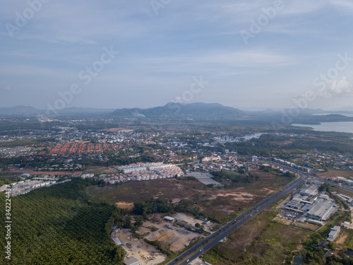 aerial view of the city around the picturesque mountains at sunrise, Kathu, Phuket