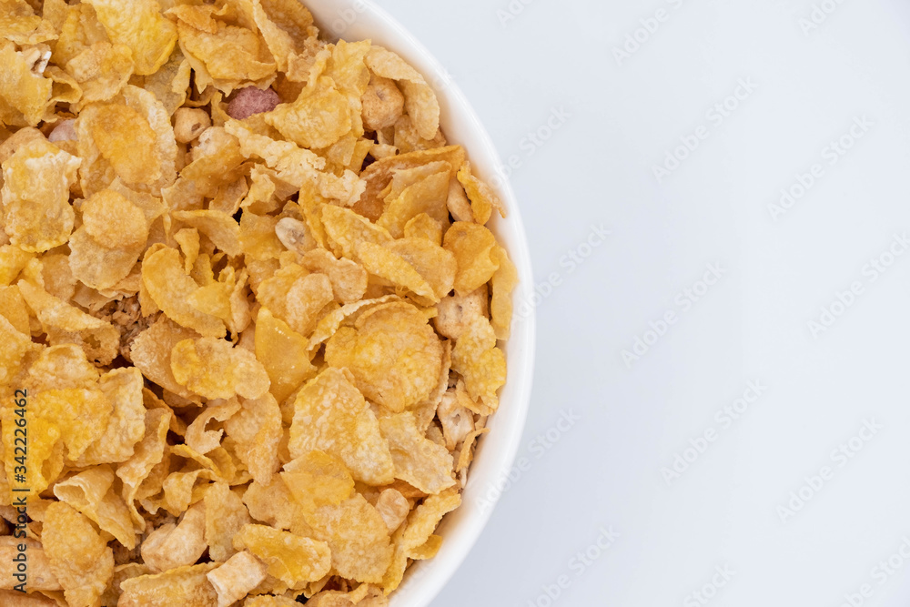 cereal in a white bowl on white background. Healthy breakfast concept.
